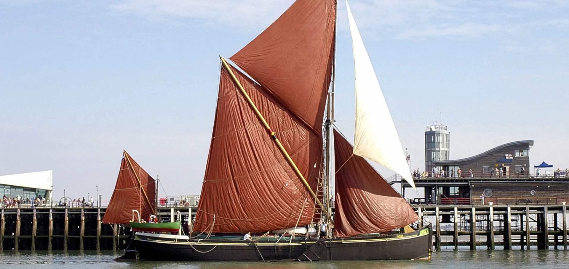 Red Sails Over The Estuary